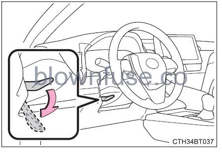 2022 Toyota Camry Adjusting the steering wheel and mirrors FIG 10