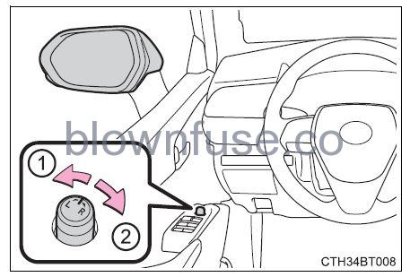 2022 Toyota Camry Adjusting the steering wheel and mirrors FIG 3